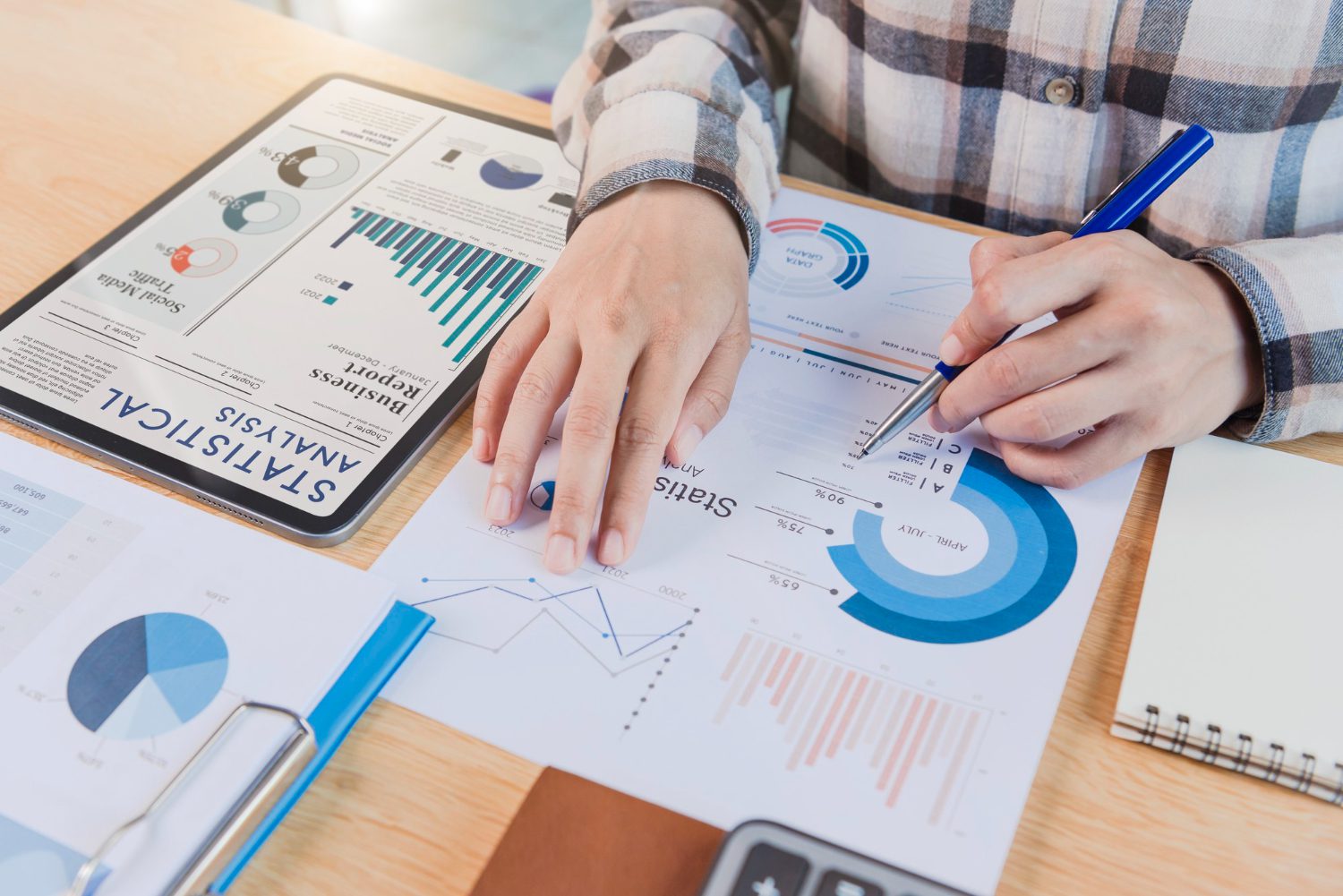 businesswoman using tablet analysis graph company finance strategy statistics success concept planning future office room